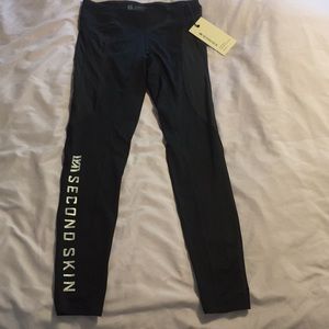 NWT Second Skin women's compression leggings.